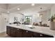 Well-lit kitchen with island opens up to the dining and living areas of this open-concept home at 2315 N 52Nd St # 102, Phoenix, AZ 85008