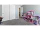 Spacious bedroom with large closet and play area at 23955 W La Salle St, Buckeye, AZ 85326