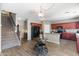 Spacious eat-in kitchen with stairs, stainless appliances, and wood-look floors at 23955 W La Salle St, Buckeye, AZ 85326