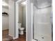 Stylish main bathroom includes a large shower with glass doors and modern fixtures at 23955 W La Salle St, Buckeye, AZ 85326