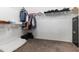 Spacious walk-in closet with ample shelving and storage for clothes and personal belongings at 23955 W La Salle St, Buckeye, AZ 85326