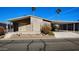 Charming single-story home with a carport and low-maintenance desert landscaping at 2400 E Baseline Ave # 144, Apache Junction, AZ 85119