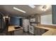 Bright kitchen features modern appliances, ample cabinet space, and a butcher block island at 2400 E Baseline Ave # 144, Apache Junction, AZ 85119