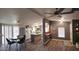 Open concept kitchen and dining area featuring wood flooring and stainless steel appliances at 2400 E Baseline Ave # 144, Apache Junction, AZ 85119