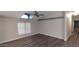 Spacious living room with vaulted ceiling, ample natural light, and contemporary flooring at 2400 E Baseline Ave # 144, Apache Junction, AZ 85119