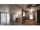 Open-concept living room leading into a bright kitchen with a butcher block island at 2400 E Baseline Ave # 144, Apache Junction, AZ 85119