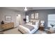 Comfortable main bedroom showcasing neutral tones, decor and a light-filled ambiance at 2400 E Baseline Ave # 144, Apache Junction, AZ 85119