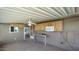 Enclosed porch area offering extra storage space and a convenient workspace at 2400 E Baseline Ave # 144, Apache Junction, AZ 85119