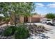 Attractive exterior of the house with a low-maintenance desert landscape and inviting entrance at 26725 W Marco Polo Rd, Buckeye, AZ 85396