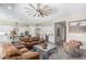 Open-concept living room seamlessly connects to the kitchen and dining areas at 2835 E Donald Dr, Phoenix, AZ 85050