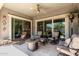 Outdoor patio with plush chairs, an outdoor fire pit, and a view of the backyard at 2835 E Donald Dr, Phoenix, AZ 85050