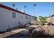 Back patio with outdoor seating, privacy fence and gravel landscaping at 303 S Recker Rd # 29, Mesa, AZ 85206