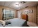 Comfortable bedroom with good-sized closet, carpeted floor, and paneled walls at 303 S Recker Rd # 29, Mesa, AZ 85206