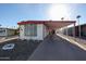Charming mobile home featuring a covered parking area and low maintenance landscaping in a desirable community at 303 S Recker Rd # 29, Mesa, AZ 85206
