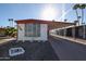 Charming mobile home featuring a covered parking area and low maintenance landscaping in a desirable community at 303 S Recker Rd # 29, Mesa, AZ 85206