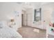 Bright bedroom with neutral carpet, a window seat, and double closets at 3109 N Black Rock Rd, Buckeye, AZ 85396