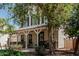 Charming two-story home with a welcoming front porch, well-manicured landscaping, and a convenient two-car garage at 3109 N Black Rock Rd, Buckeye, AZ 85396