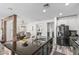 Bright kitchen featuring a large island, stainless steel appliances, and an adjacent dining area at 3109 N Black Rock Rd, Buckeye, AZ 85396