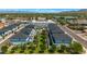 An aerial showcases townhomes with well-manicured green spaces, amenities, and neighborhood street views at 3136 E Cheryl Dr, Phoenix, AZ 85028