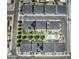 Aerial view of the community showcasing organized layout, landscaping, pool, and neighborhood streets at 3136 E Cheryl Dr, Phoenix, AZ 85028