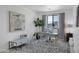Bright home office with stylish decor, modern desk setup, artwork, and natural light at 3136 E Cheryl Dr, Phoenix, AZ 85028