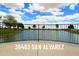 Picturesque community lake offers a serene and scenic view at 36463 W San Alvarez Ave, Maricopa, AZ 85138