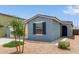 Charming home featuring stucco exterior, desert landscaping, and a welcoming front entrance at 36463 W San Alvarez Ave, Maricopa, AZ 85138