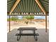 Covered picnic area at the community park with picnic tables and grills at 36463 W San Alvarez Ave, Maricopa, AZ 85138