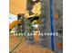 Playground rock climbing wall, slide and crawl through feature at 36463 W San Alvarez Ave, Maricopa, AZ 85138