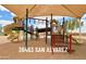 Well-equipped playground with slides and climbing structures in common area at 36463 W San Alvarez Ave, Maricopa, AZ 85138