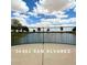 View of the community pond, as seen from a paved overlook at 36463 W San Alvarez Ave, Maricopa, AZ 85138