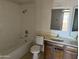Standard bathroom featuring a tub and shower combination with a sink and vanity at 3719 W Thunderbird Rd, Phoenix, AZ 85053