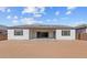 Spacious backyard with a patio and ample room for customization at 37627 W Padilla St, Maricopa, AZ 85138