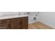 Functional laundry area with cabinetry and a sink at 37627 W Padilla St, Maricopa, AZ 85138