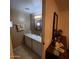 Bathroom with a vanity, mirror, and additional drawers for storage at 4065 E University Dr # 240, Mesa, AZ 85205