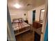 Cozy bedroom with carpeted floors, window and dresser at 4065 E University Dr # 240, Mesa, AZ 85205