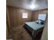 Cozy bedroom with a comfortable bed and a view of the backyard at 4065 E University Dr # 240, Mesa, AZ 85205