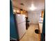 Kitchen featuring a refrigerator and wooden cabinets at 4065 E University Dr # 240, Mesa, AZ 85205