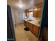 Kitchen featuring wooden cabinets and lots of counter space at 4065 E University Dr # 240, Mesa, AZ 85205