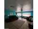 Comfortable living room featuring plenty of space, ceiling fan, and attractive flooring at 4065 E University Dr # 240, Mesa, AZ 85205