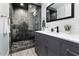 Contemporary bathroom with a glass-enclosed shower and modern vanity at 4208 N Parkway Ave, Scottsdale, AZ 85251