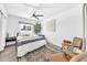 Cozy bedroom featuring a ceiling fan, cozy seating, and ample natural light at 4208 N Parkway Ave, Scottsdale, AZ 85251