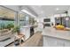 Bright and airy kitchen featuring an island, stainless appliances, and exterior access at 4208 N Parkway Ave, Scottsdale, AZ 85251