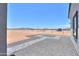 Spacious backyard featuring gravel and desert landscape at 43481 W Carefree Pl, Maricopa, AZ 85138