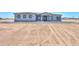 Single-story house with modern architectural details and desert landscaping at 43481 W Carefree Pl, Maricopa, AZ 85138