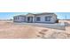 Modern home with a neutral color scheme and paved walkways at 43481 W Carefree Pl, Maricopa, AZ 85138