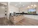 Open kitchen featuring a stylish island, stainless steel appliances, and granite countertops at 4684 E Coachwhip Rd, Cave Creek, AZ 85331