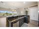 Open concept kitchen with granite countertops, stainless steel appliances, and scenic views at 4684 E Coachwhip Rd, Cave Creek, AZ 85331