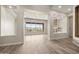 Open-concept living room boasting expansive windows, natural light, and scenic desert views at 4684 E Coachwhip Rd, Cave Creek, AZ 85331