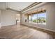 Bright living room showcasing a large window, recessed lighting, and seamless indoor-outdoor flow at 4684 E Coachwhip Rd, Cave Creek, AZ 85331